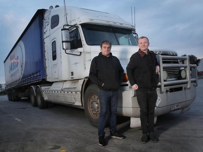 Truck driver Frank Black and Herald Sun journalist Angus McIntyre prepare to drive his truck to Adelaide. Picture: David Crosling