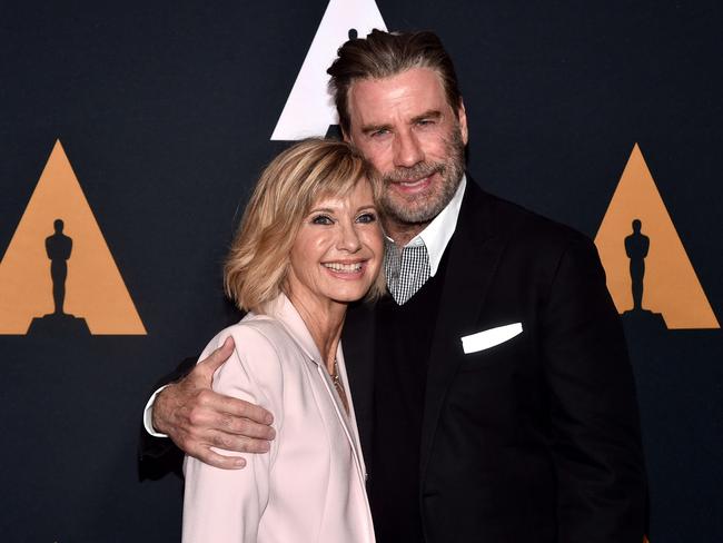 Olivia Newton-John and John Travolta at the Grease 40th anniversary last August in LA. Pic: Getty 