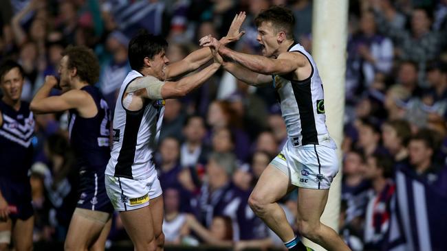 Robbie Gray and Angus Monfries celebrate a goal. Picture: Simon Cross.