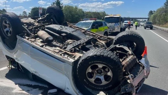 Emergency services rushed to the Bruce Hwy soutbound at Coochin Creek after a vehicle rolled on Friday afternoon.