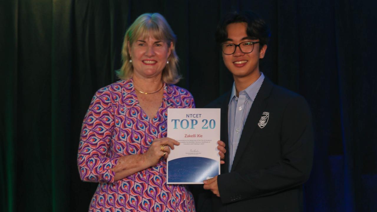 Education Minister Eva Lawler presents Essington School's Zakelli Xie after the announcement of 2022 NTCET Top 20 Year 12 Students and 2022 Top Aboriginal Student at NT Parliament House. Picture: Glenn Campbell