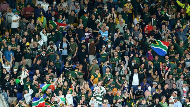 South African fans cheer during The Rugby Championship match between the South Africa Springboks and New Zealand All Blacks at Cbus Super Stadium. Photo: Jono Searle/Getty Images