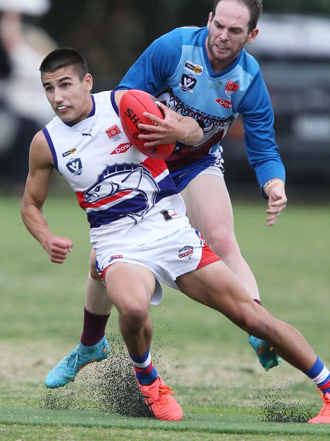 Football BFL: Modewarre v Queenscliff. Modewarre 16 Jackson OÃ•Hanlon chases Queenscliff 57 Sol Bowtell Picture: Mark Wilson