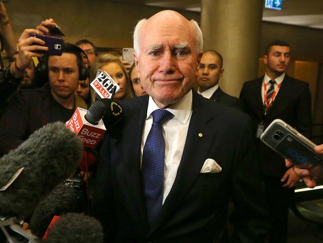 Former Australian prime minister John Howard turns away after speaking to the media after he arrived to a post election Liberal Party event in Sydney. Picture: David Moir