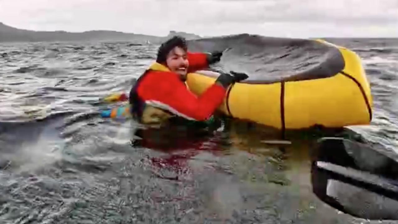 Dell shouted at his son to stay calm and lean on his kayak for support. Picture: Jam Press