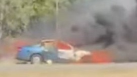 A car on fire at the M1 near Chinderah.