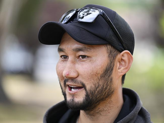 Found hiker Hadi Nazari's cousin Hussain Ali speaks outside Cooma Hospital on Thursday. Picture: Martin Ollman