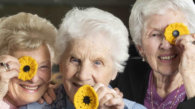 DoSomething Day 2018. Senior women at Blue Hills Village in Prestons have knitted 500 poppies for the Invictus Games.  May Tilly, Dot Macarthy and Pam Lee. Photographed 25th July 2018.  (AAP IMAGE/Matthew Vasilescu)