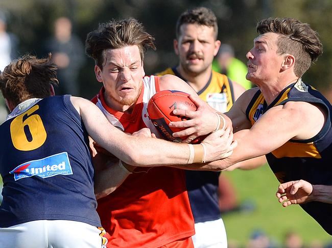 NFL Division 2 grand final: Lalor V Whittlesea. (L-R) Whittlesea's Nathan Andrews, Lalor's Ben Curtis and Whittlesea's Matthew Domauf. Picture: Josie Hayden