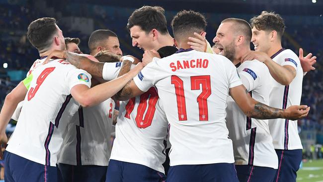England's players celebrate during their win over Ukraine at the Olympic Stadium in Rome. Picture: AFP