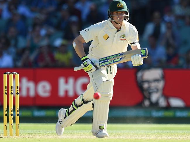 Australian captain Steve Smith runs between wickets during the day-night Test match between Australia and South Africa at the Adelaide Oval.