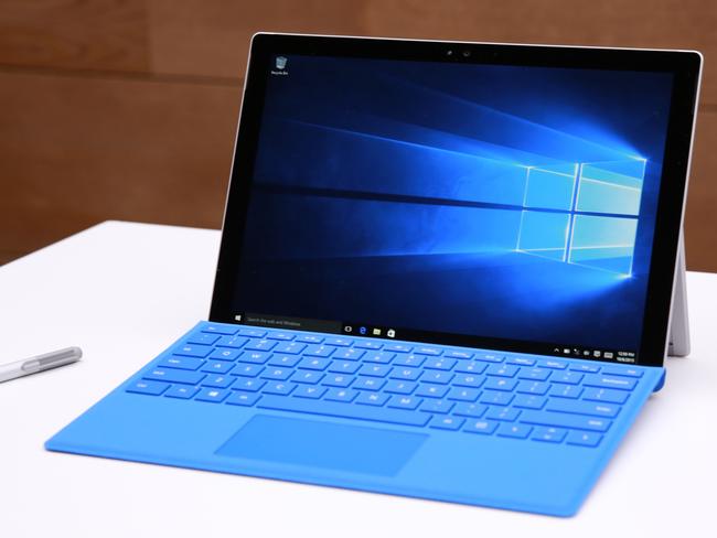 This Tuesday, Oct. 6, 2015, image provided by Microsoft shows the Surface Pro 4 at a Windows 10 Devices Event, in New York. With the new Surface Pro 4, typing on a Microsoft tablet finally feels like typing on a regular laptop. (Mark Von Holden/Microsoft via AP)