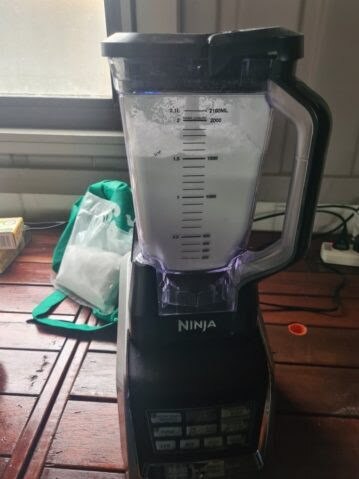 Police say they located and seized 1.6kg of cocaine, $27,000 cash, a drug press and drug related paraphernalia. Picture: QPS Media