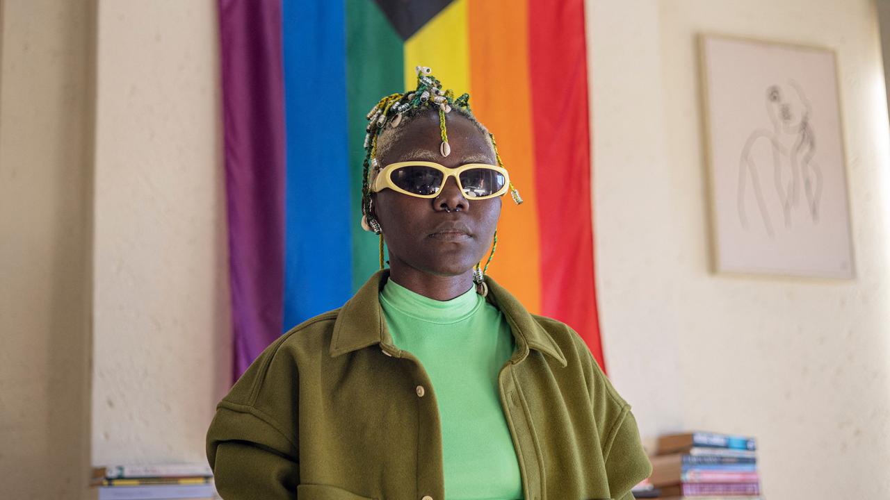 Ugandan LGBTQ rights defender DeLovie Kwagala, also known as Papa De, poses for a portrait in Johannesburg on May 19, 2023. (Photo by Michele Spatari / AFP)