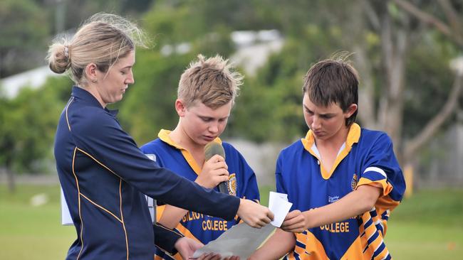 Gilroy teacher Maddyn White with students Grant Martin and Connor Matsen read a touching poem by Jonny Pearce, ‘The Will Murdoch Perpetual Shield’. Photographs from the Will Murdoch Perpetual Shield. The annual U14 rugby league competition, in its second year, involved Gilroy Santa Maria College, Ingham State High School and St Teresa's Catholic College Abergowrie. Picture: Cameron Bates