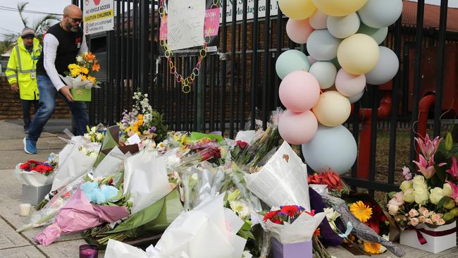 The growing floral tribute left outside Banksia Road Public School. Picture:John Grainger