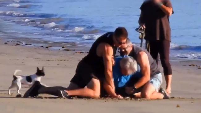 Peter Foster is crash tackled and arrested on a remote beach in Queensland. Picture: 60 Minutes/Channel 9