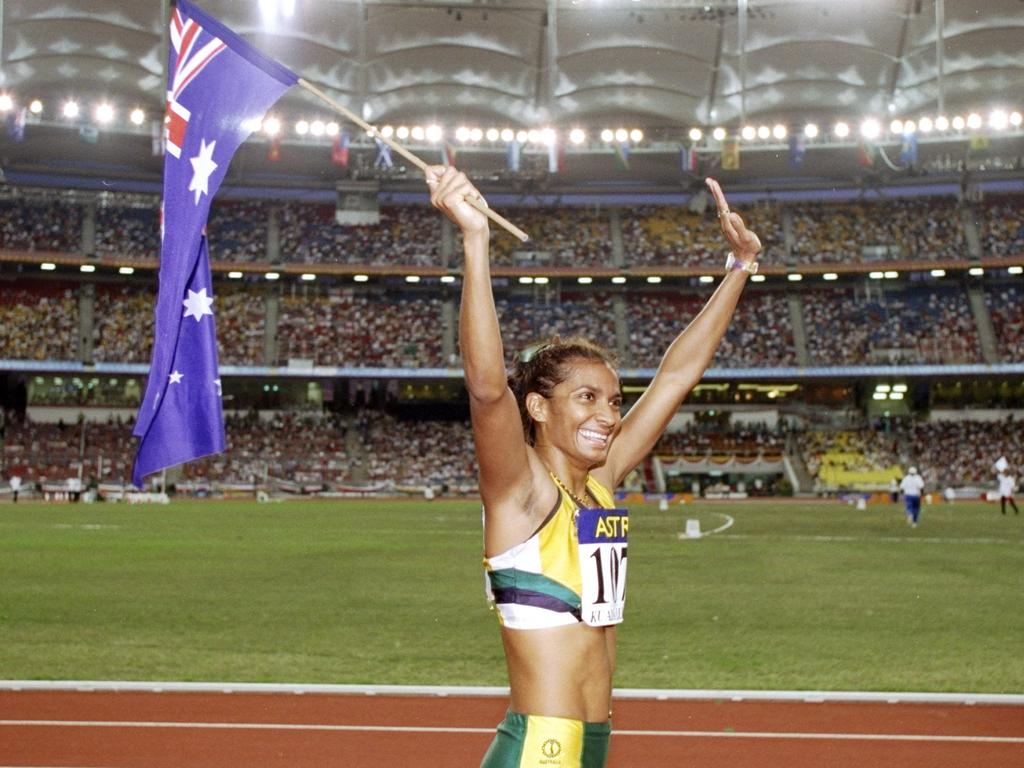 Nova Peris celebrates victory in the 200m during the 1998 Commonwealth Games. Picture: Nick Wilson/Allsport
