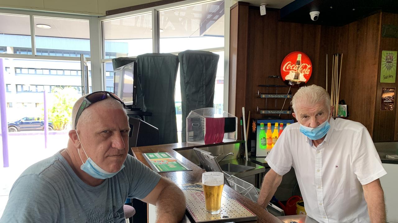 Commercial fisherman Ross Thompson sits with a beer at the Golden Gecko Hotel on Sydney Street in Mackay next to publican Alan Venturi. Both men are unhappy about the new beer tax set to come into effect. Picture: Duncan Evans