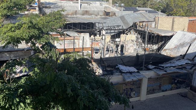 In April 2023, a store on the corner of Mary St and Memorial Lane burned down. Three months later, business owners, still having to live with a closed-off footpath and are wondering when it would get cleaned up. Picture: Christine Schindler