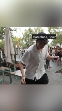 Protesters squirt Barcelona tourists with water pistols