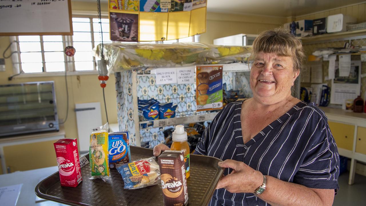 ORDER UP: Beryl Nicholson is celebrating 45 years as the tuck shop convener at Harristown State School. Picture: Nev Madsen