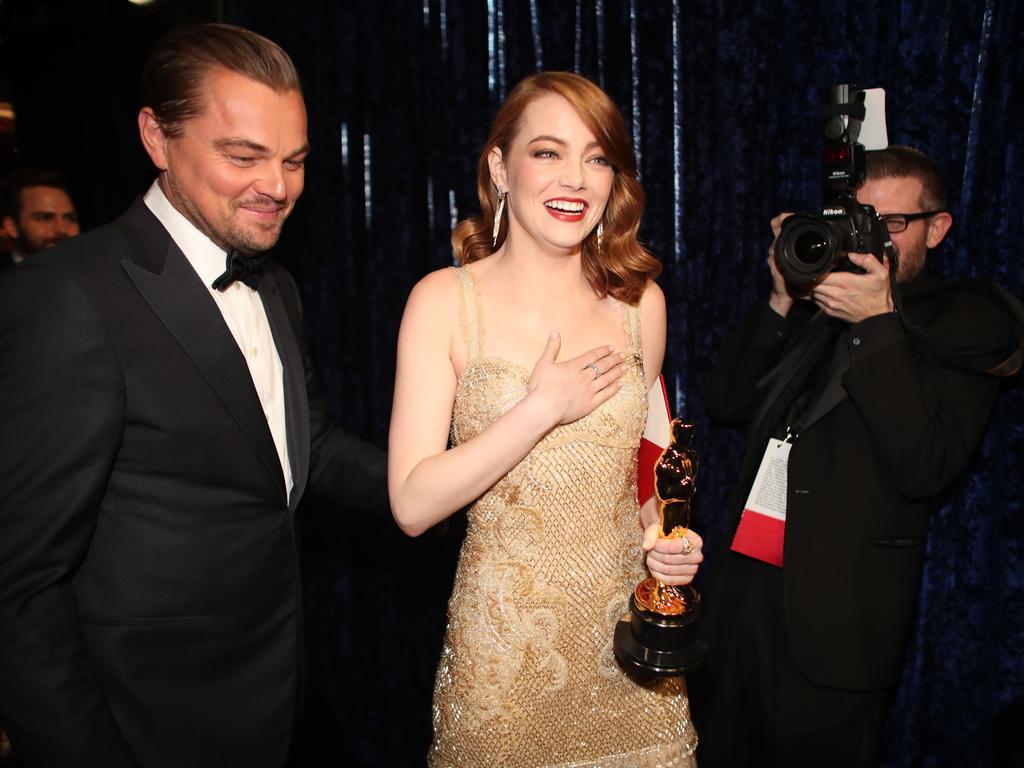 Leonardo DiCaprio and Emma Stone, winner of Best Actress for ‘La La Land’ arrive backstage during the 89th Annual Academy Award. Picture: AFP