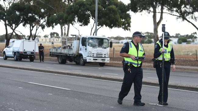 The truck sits on the side of Kings Road at Salisbury South after a cyclist was killed in a crash, with Major Crash investigators at the scene. Picture: Tricia Watkinson