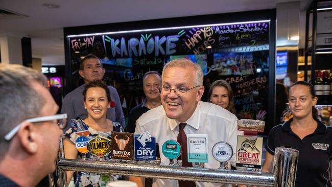 Prime Minister Scott Morrison at Cazalys Palmerston Club with Lia Finocchiaro, left. Ms Finocchiaro said the CommSec report shows that ‘not enough is being done to support the Territory’. Picture: Jason Edwards