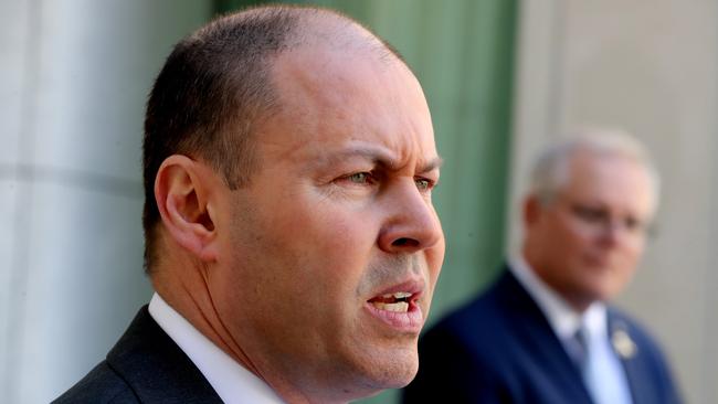 Josh Frydenberg, left, says the business package will provide ‘further tax relief to attract and retain workers and reduce red tape’. Picture: Adam Taylor