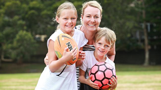 Kids will be given devices to wear which will measure how active they are during the day. Pictured is Emma Links with her daughter Mia and Jamie. Picture: Adam Yip/Manly Daily