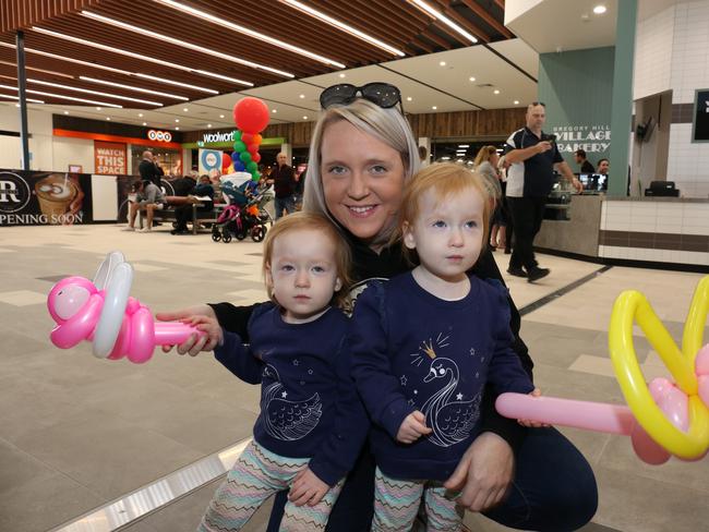 Danielle Hope and her twin daughters Tahlia and Kyah (2) enjoying the celebrations at Gregory Hills Town Centre. Picture: Robert Pozo