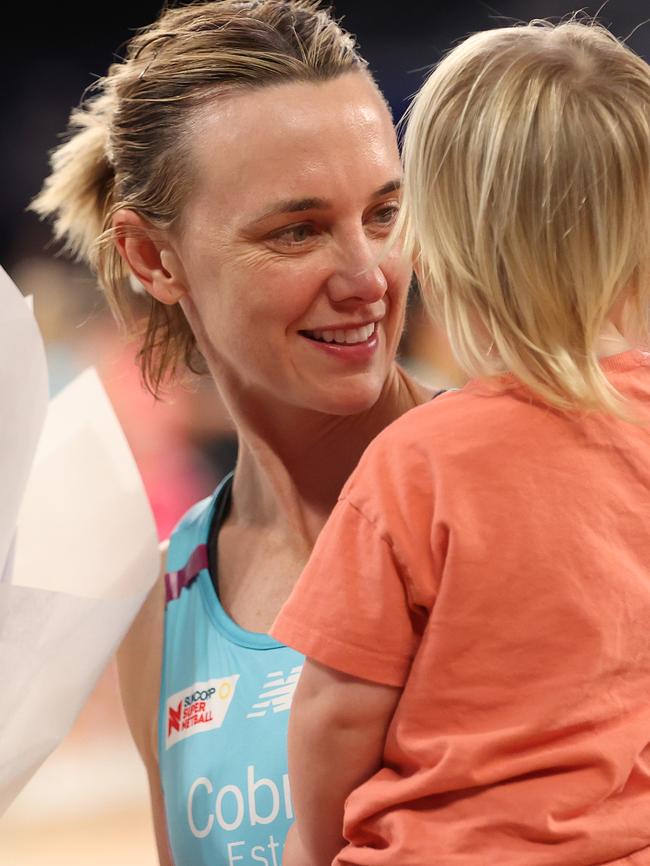 Nat Medhurst with one of her two children during her comeback in 2024. Picture: Kelly Defina/Getty Images