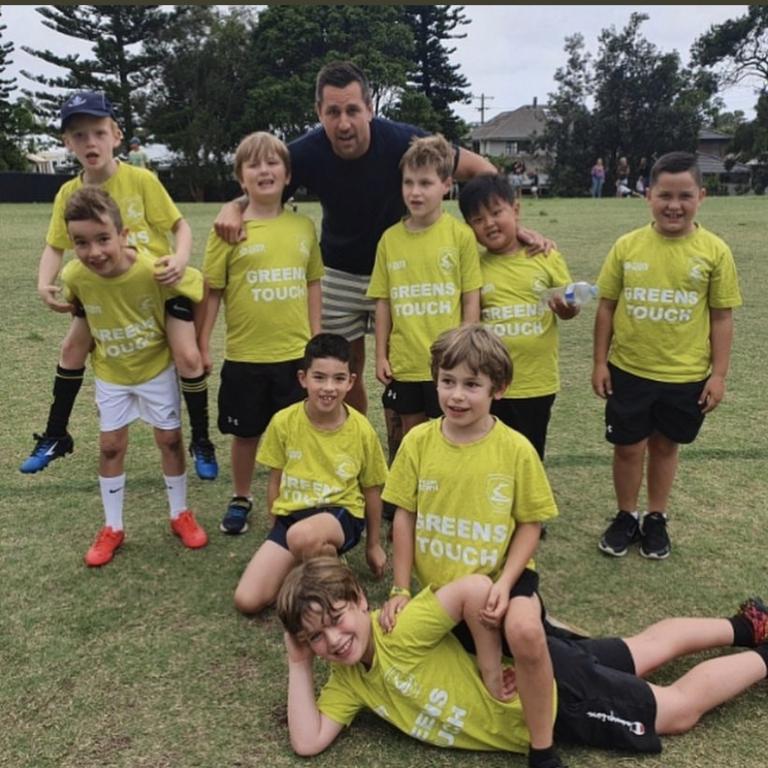 Knights star Mitchell Pearce jumps in for a spot of kids coaching in Newcastle.