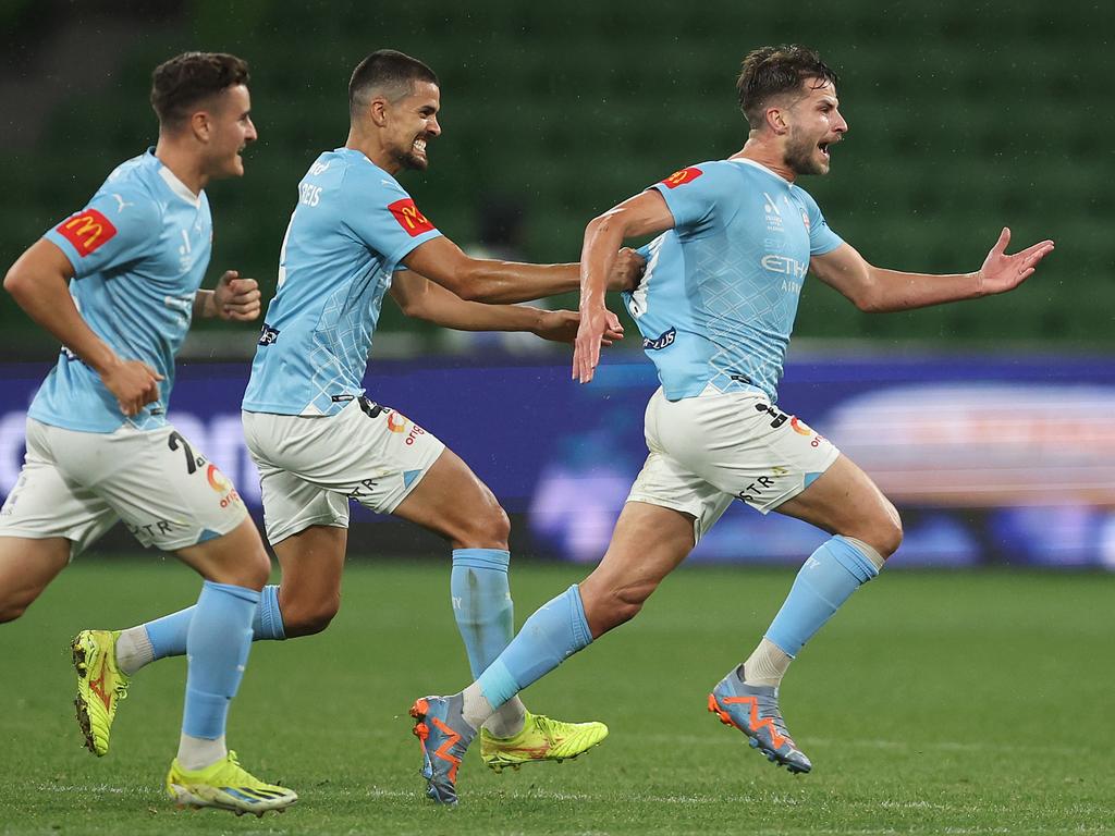 Terry Antonis is mobbed by Melbourne City teammates after his stunner. Picture: Getty Images