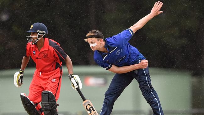 Deuchar bends his back at the bowling crease.