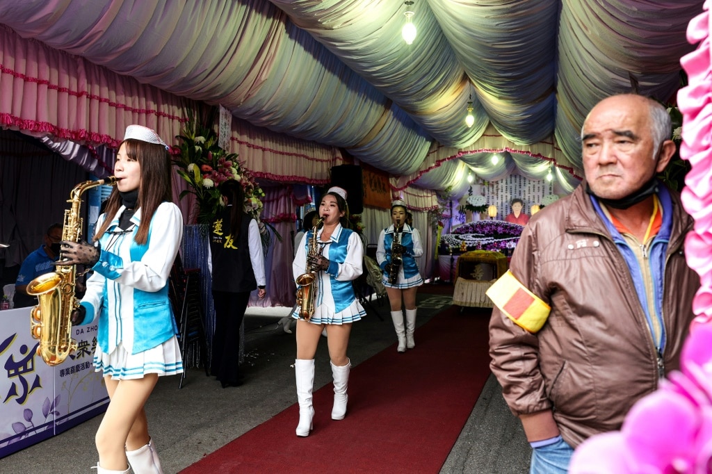 Da Zhong women's group is part of a long tradition of funeral marching bands performing in Taiwan for families wanting to give their loved ones an upbeat send-off