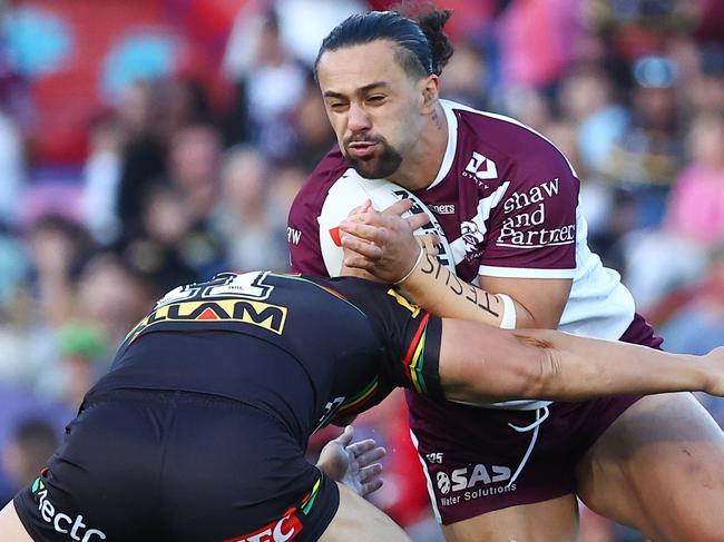PENRITH, AUSTRALIA - JUNE 09: Josh Aloiai of the Sea Eagles is tackled during the round 14 NRL match between Penrith Panthers and Manly Sea Eagles at BlueBet Stadium, on June 09, 2024, in Penrith, Australia. (Photo by Jeremy Ng/Getty Images)