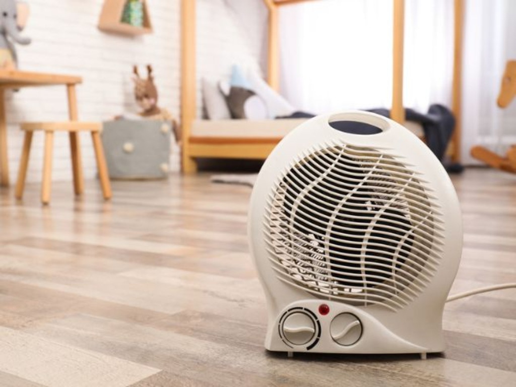 A timer and thermostat are the must-have features to look out for when buying a heater. Picture: iStock/Liudmila Chernetska.
