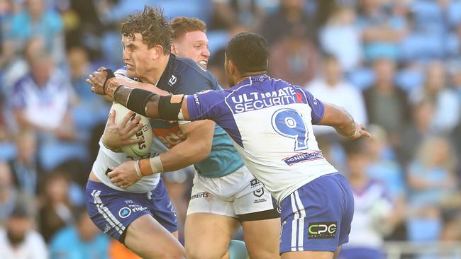 Napa catches Jarrod Wallace across the chops. Picture: Chris Hyde/Getty