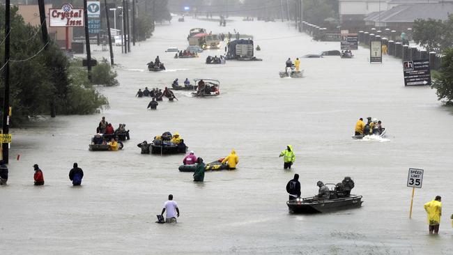 Floodwaters brought on by Tropical Storm Harvey in Houston. Scientists say climate change is faster, more extensive and worse than they thought a quarter century ago. Picture: AP