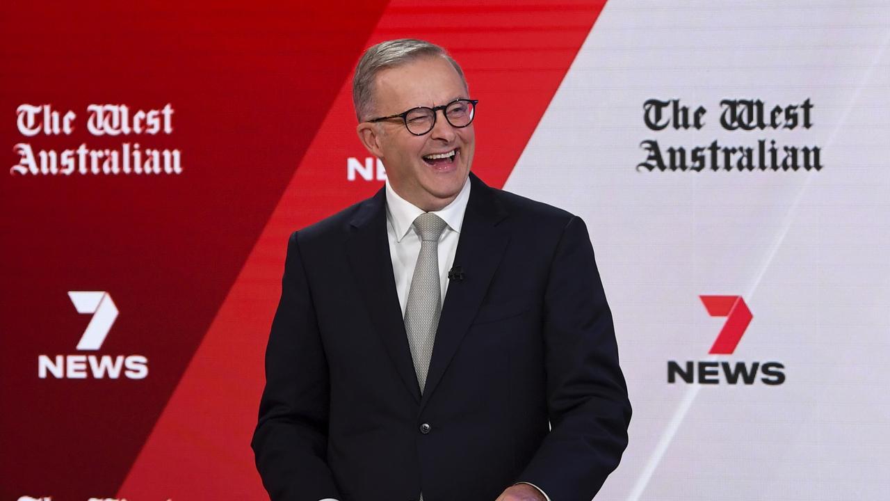 Mr Albanese reacts during the third leaders' debate at Seven Network Studios. AAP Image/Lukas Coch)