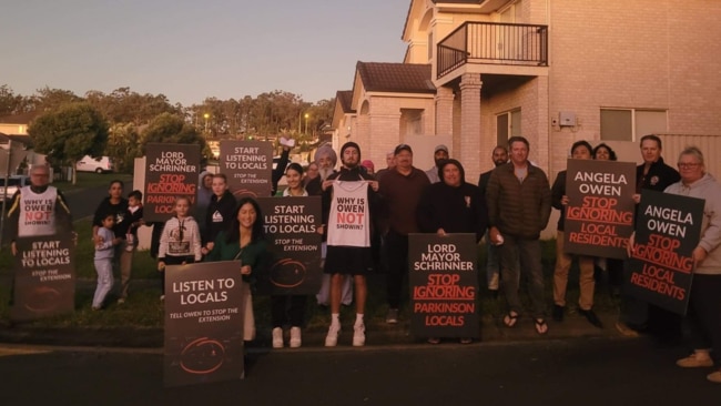 Residents protest near the proposed Parkinson subdivision.