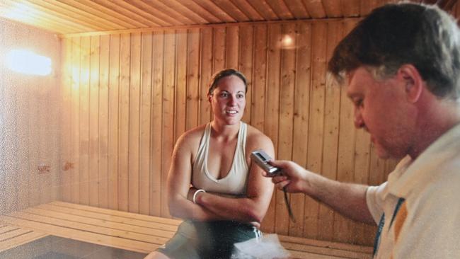 Historical photos for David Lems, interviewing Ipswich weightlifting champ Deborah Acason.