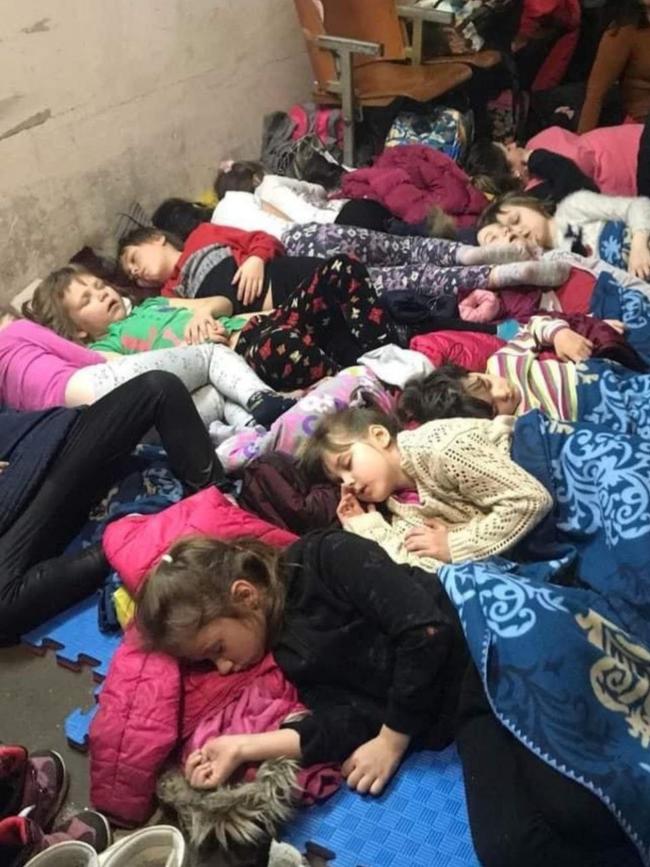 A picture shared on social media from the Ukrainian parliament showing children sleeping in a bunker.