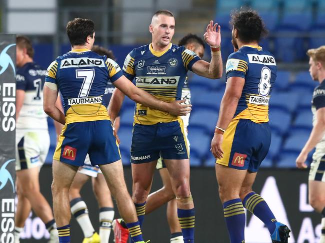 The Eels celebrate during their round 23 victory over the Cowboys. Picture: Chris Hyde / Getty Images