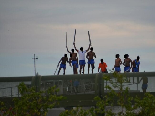 Youths rioting on top of a building at Cleveland Youth Detention Centre in 2016. Picture: Domanii Cameron.