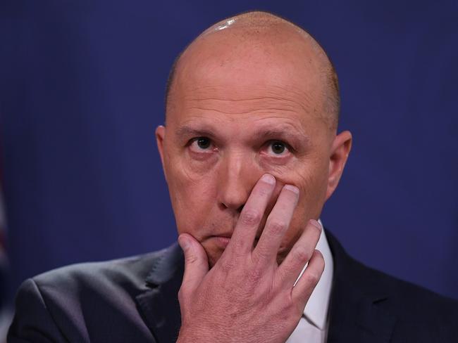 Federal Minister for Home Affairs Peter Dutton speaks to the media during a press conference at the Commonwealth Parliamentary offices in Sydney, Tuesday, November 20, 2018. (AAP Image/Dean Lewins) NO ARCHIVING