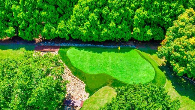 A putting green at the property.