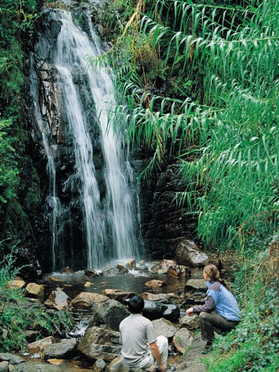 Tourists stopping at Second Falls on the Yurrebilla Trail in Morialta Conservation Park.